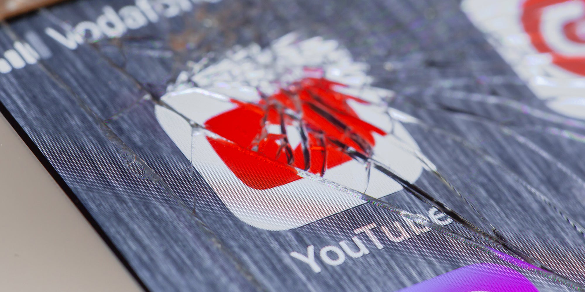youtube logo under broken screen