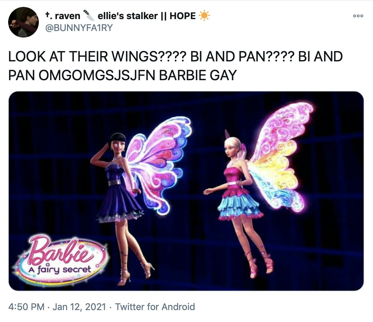 'LOOK AT THEIR WINGS???? BI AND PAN???? BI AND PAN OMGOMGSJSJFN BARBIE GAY' promotional image from Barbie, a fairy secret. The cgi doll on the left has dark hair, a knee length dress with a puffy skirt and blue, pink and purple wings. The doll on the right has a blonde ponytail, a pink and blue frilly dress and pink, yellow and blue wings.