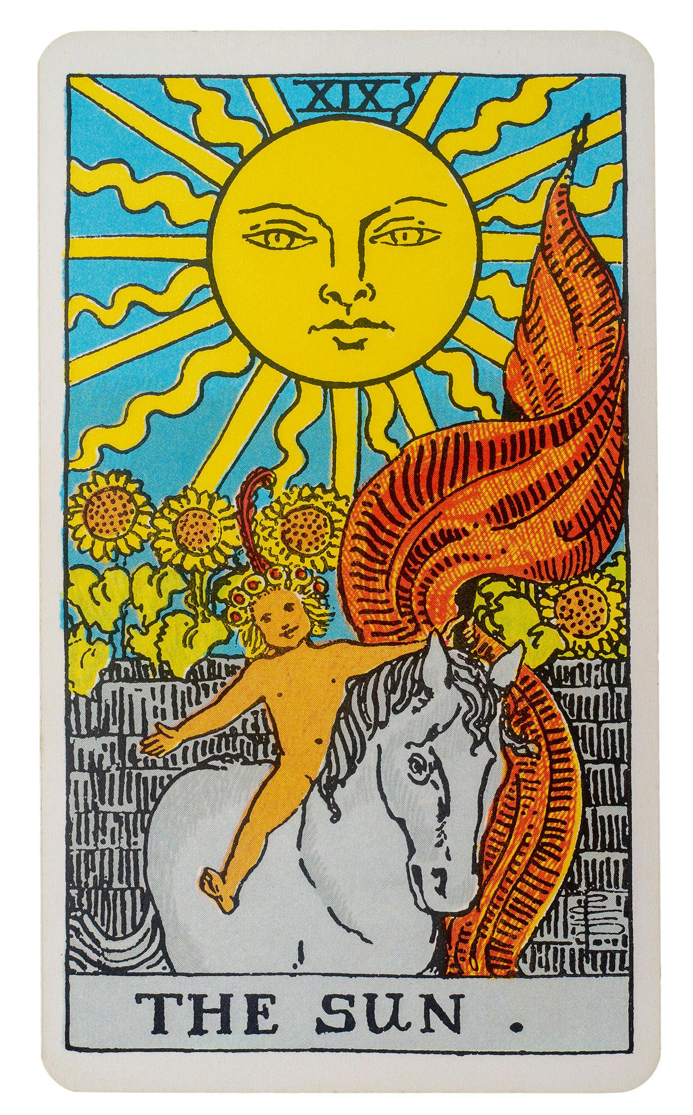 the sun card from the rider-waite deck. Image of a baby rising a horse with the sun and sunflowers in the background.