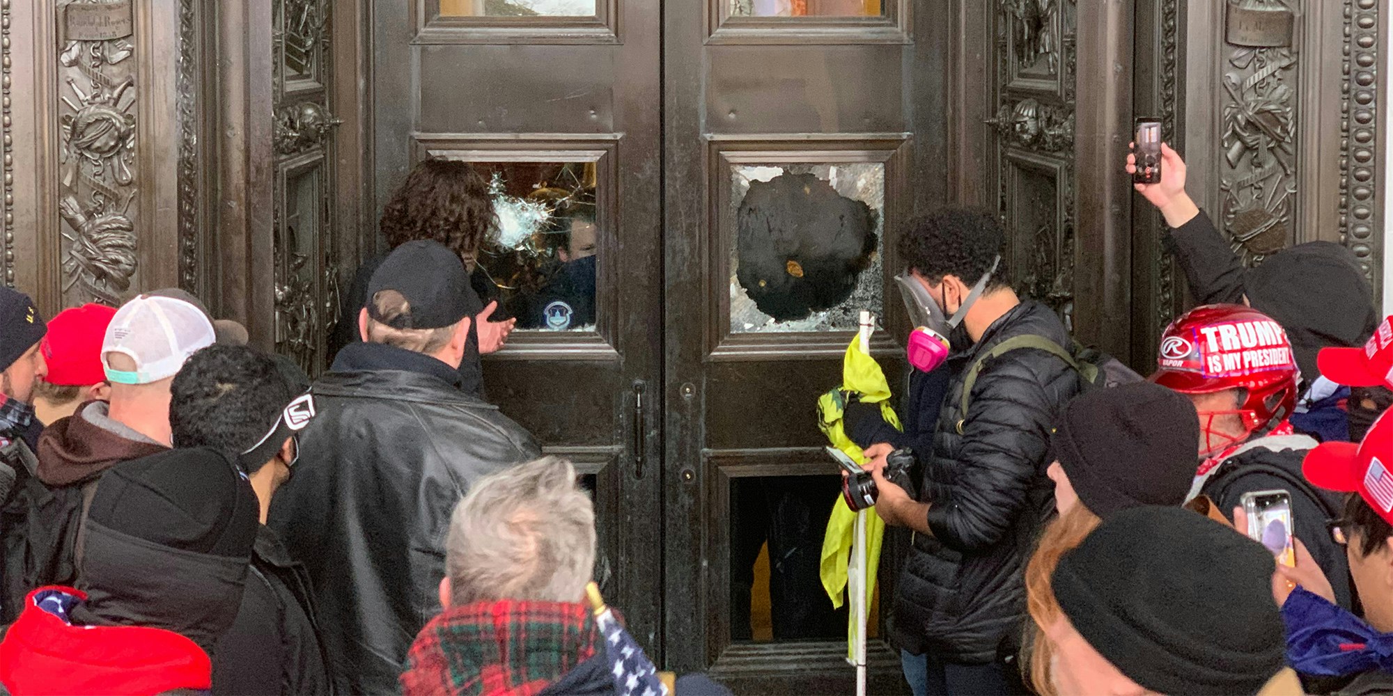 Trump supporters smash windows to break into the Capitol building