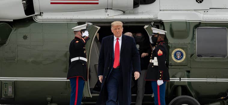 trump walking in front of marine one