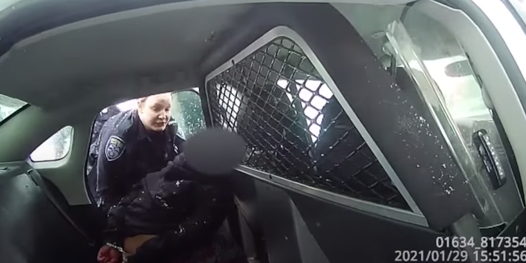 New footage of nine year old pepper sprayed and handcuffed in back of police car