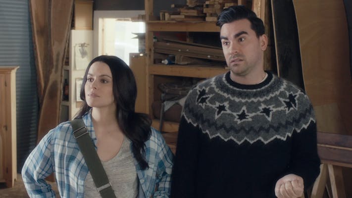 An Image of Daniel Levy in his star sweater on the TV series Schitt's Creek.