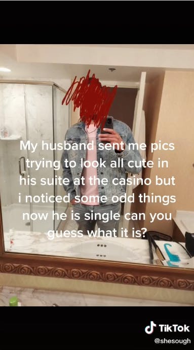 man taking mirror selfie with text overlayed on the photo