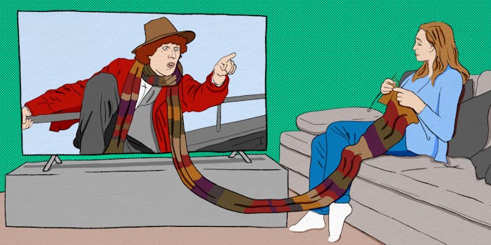 The Doctor pointing from television screen, his scarf extending outside the television onto the lap of a woman who is knitting it while watching the show.
