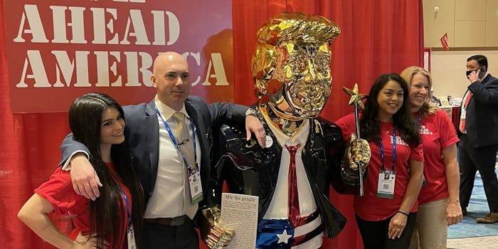 A gold statue of former President Donald Trump at CPAC