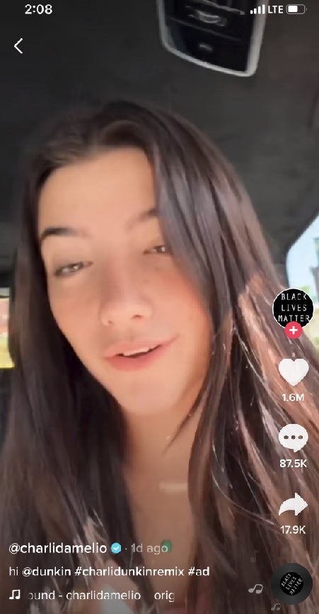 A Charli Damelio TikTok showing her verified badge.