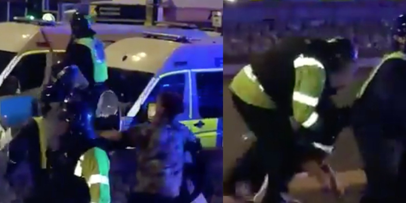 Video shows officers beating a photographer, and then being bit by their own dog