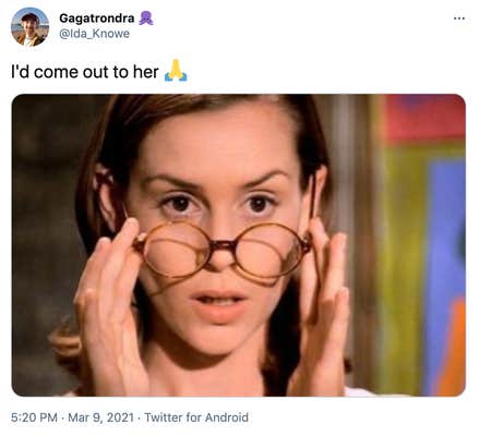"'d come out to her 🙏" Miss Honey, a white woman with short brown hair and big round glasses, looking over the rims with an intent expression