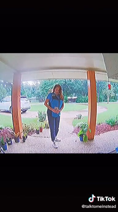amazon deliver driver taking photo of package