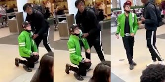 man dressed like ben 10 on one knee and then being helped up
