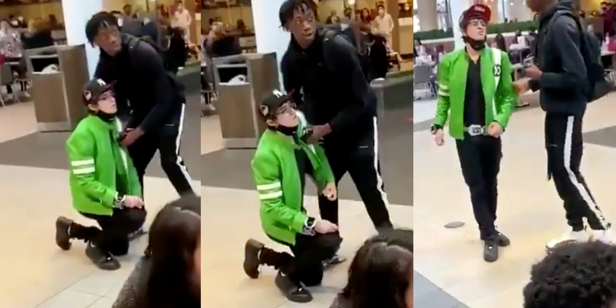 man dressed like ben 10 on one knee and then being helped up