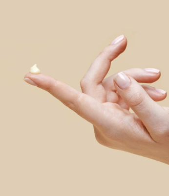 Dame Product's arousal serum on a finger.
