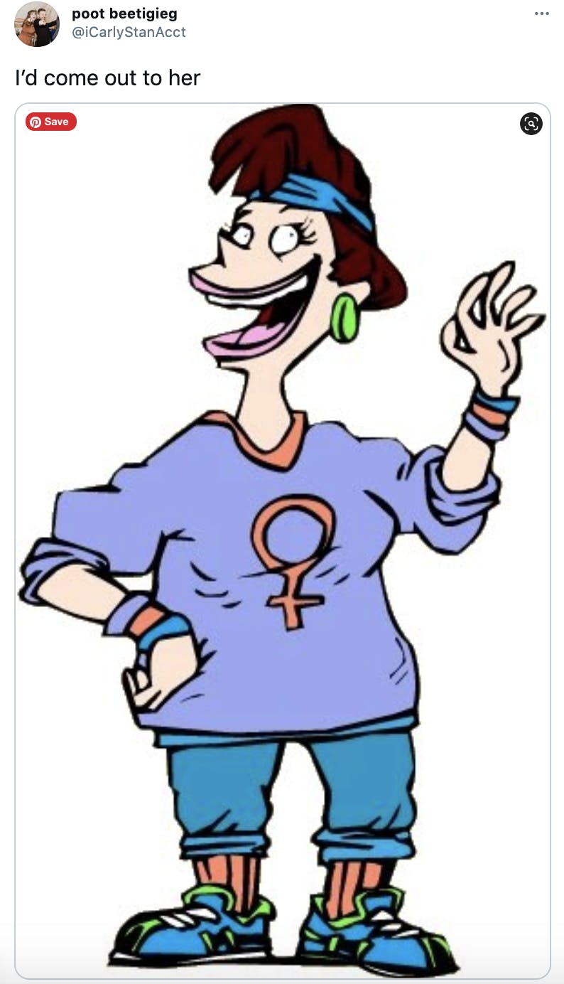 'I’d come out to her' a grinning cartoon woman with brown hair and a purple top with the women's symbol on it