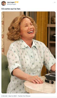 "I’d come out to her." Kitty, an older white woman in a floral dress throws her head back laughing