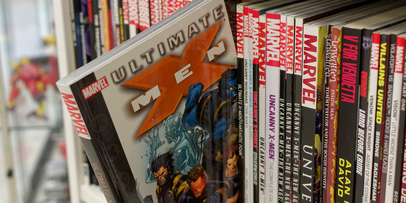 shelf of marvel graphic novels and trades