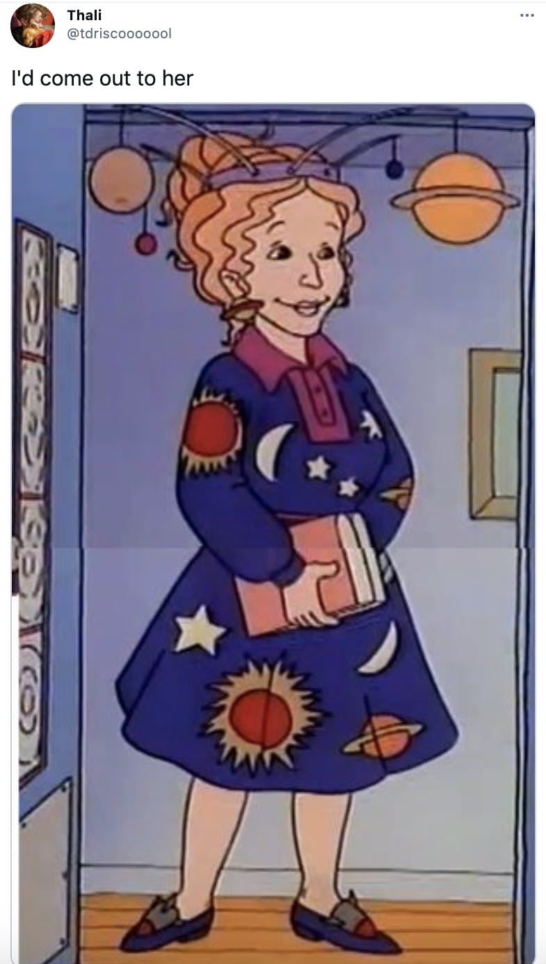 'I'd come out to her' Ms. Frizzle, a cartoon woman with curly red hair in a space patterned dress with a solar system hat