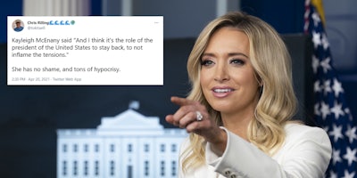 Former White House Press Secretary Kayleigh McEnany pointing at a podium. She is next to a tweet criticizing her for saying Biden should not 'inflame the tensions.'