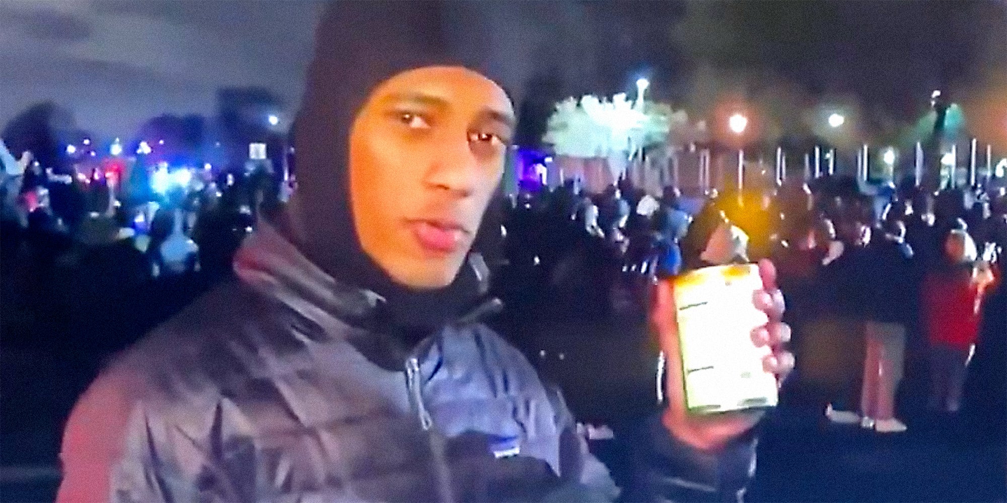 A man holding a can of soup.