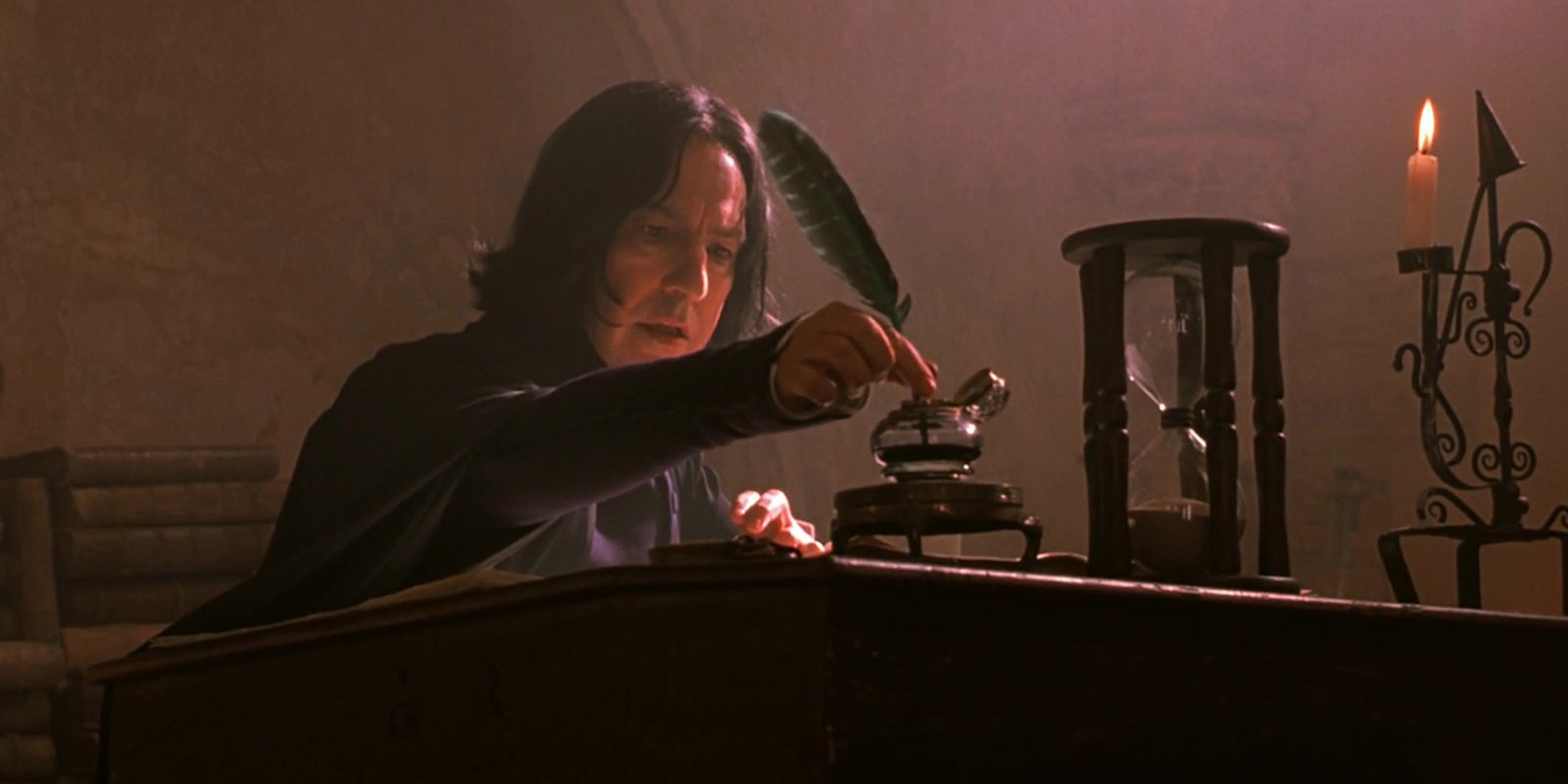 Professor Snape using an inkwell