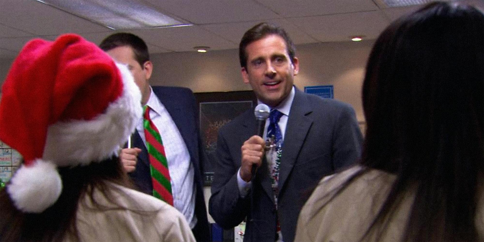 Michael Scott (played by Steve Carell) singing into a microphone.