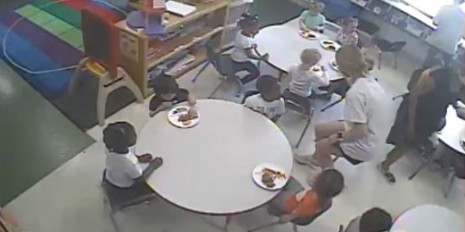 screenshot of live stream featuring only the white kids in a daycare center class eating