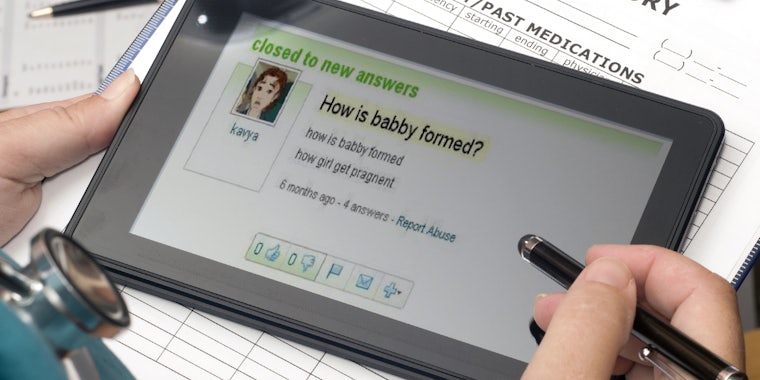 doctor holding tablet with 'How is babby formed?' Yahoo! Answers question