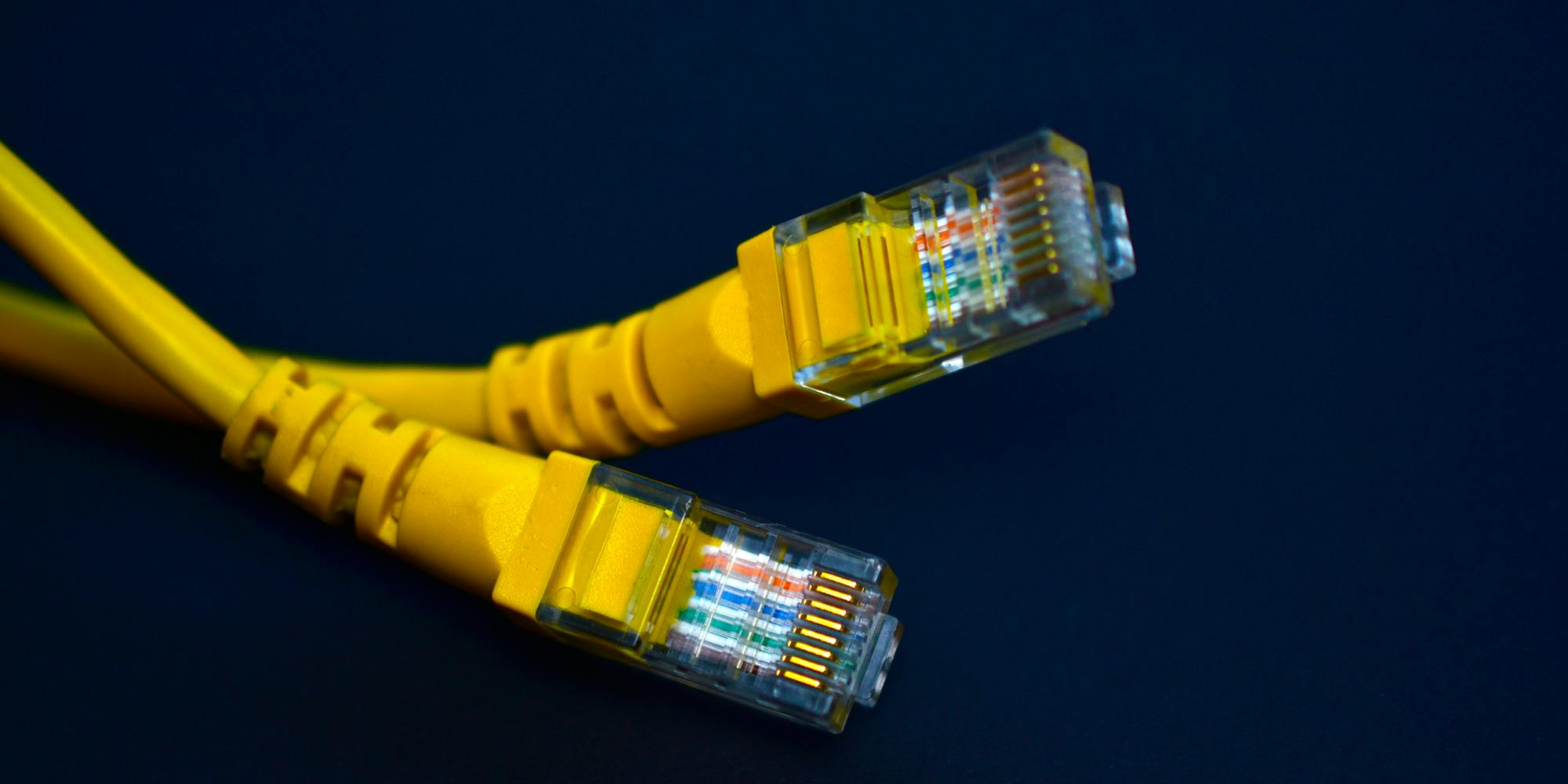 Two ethernet cables delivering broadband internet.