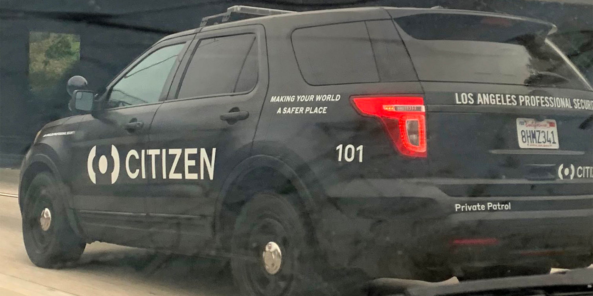 Black SUV with CITIZEN logo on the side