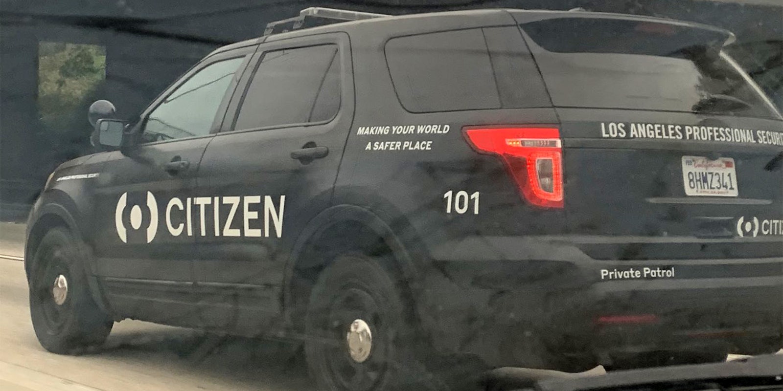 Black SUV with CITIZEN logo on the side