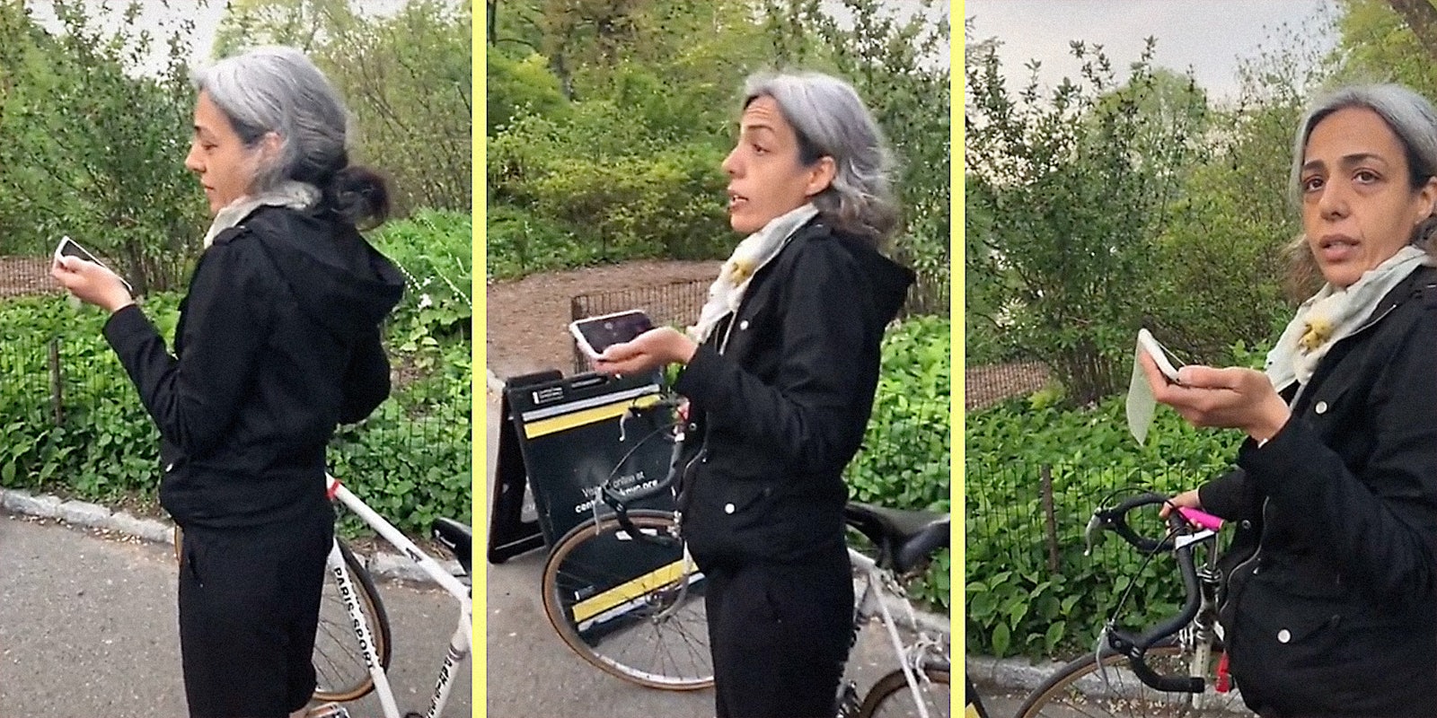 A woman with a phone and bicycle.