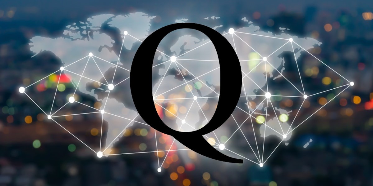 The letter Q over a world map.