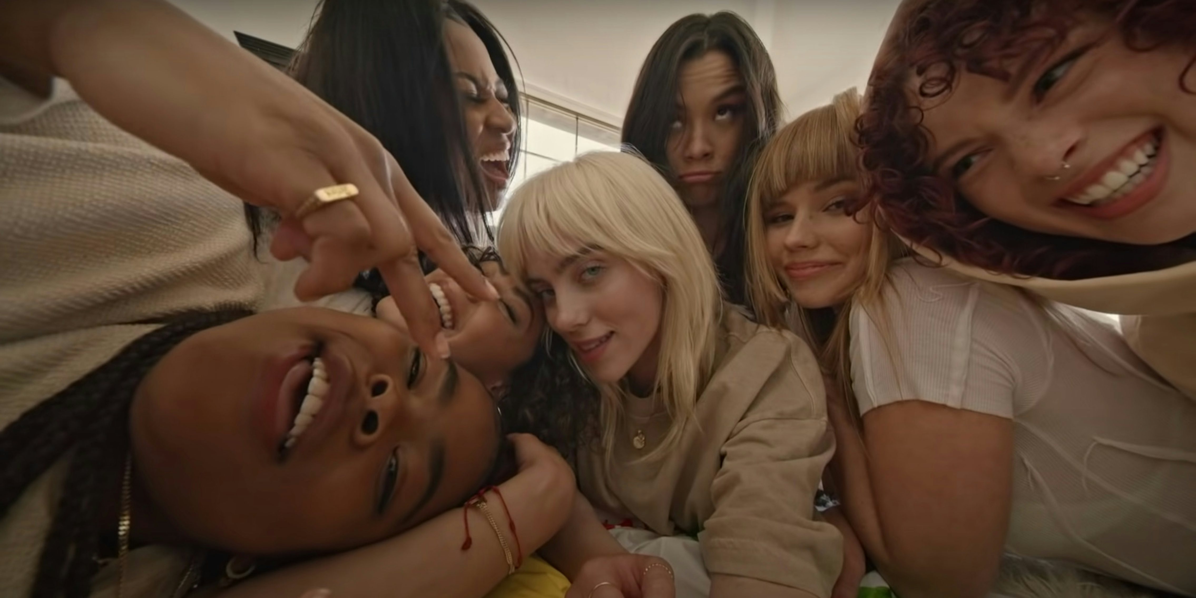 billie eilish surrounded by other women