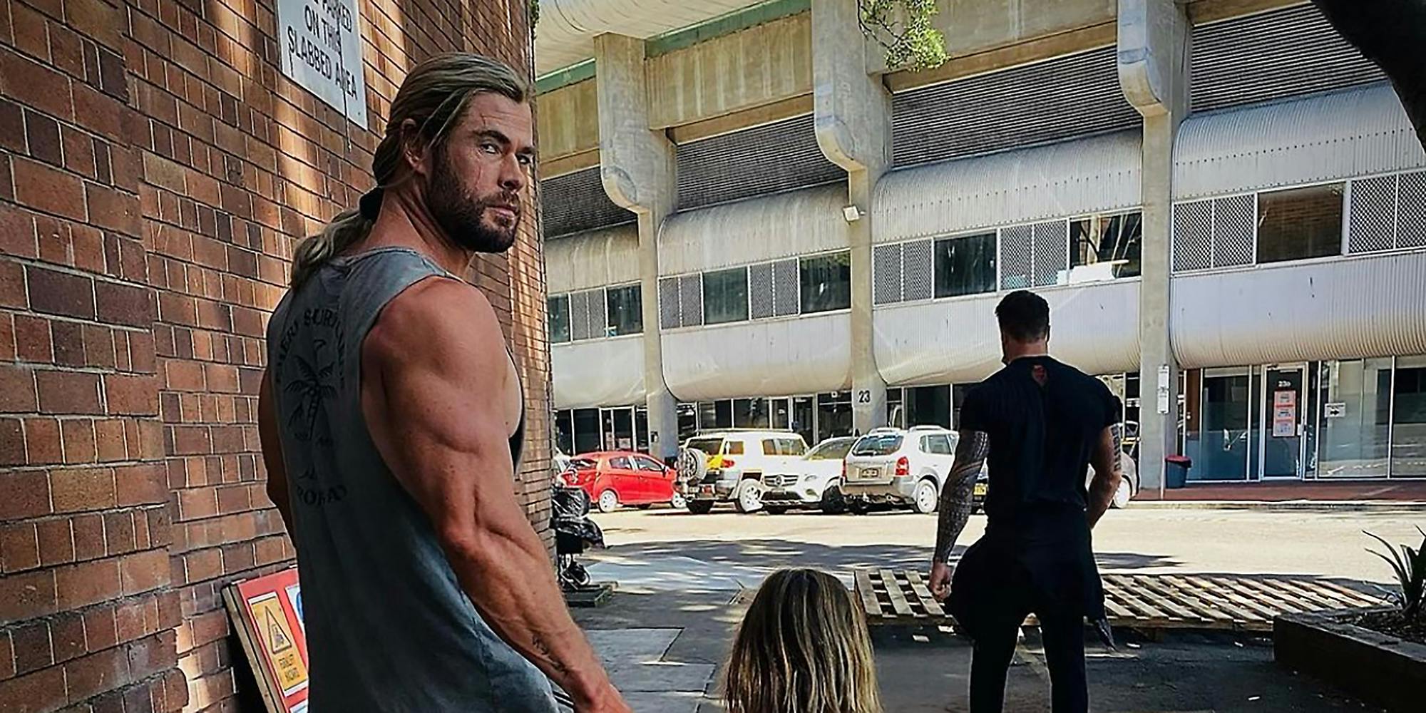 Chris Hemsworth's Jacked Arms Spark Debate About Body Standards