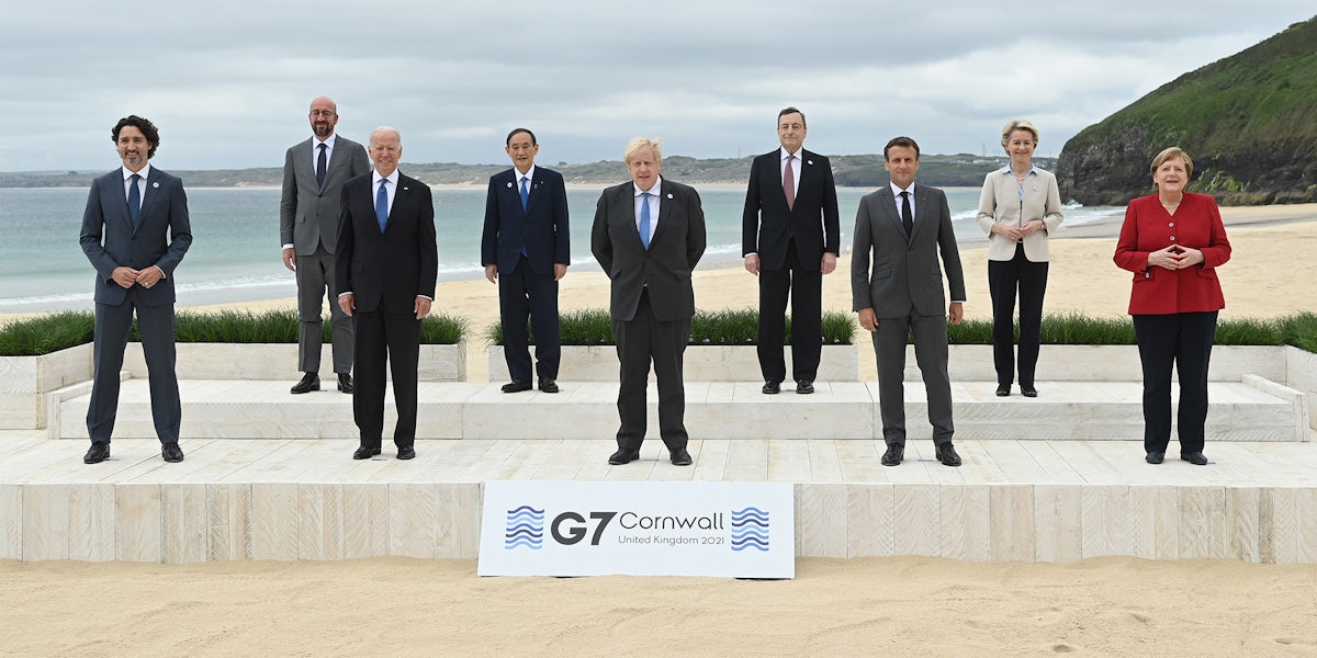 EU Council President of the European Council Charles Michel, Japanese Prime Minister Yoshihide Suga, Italian Prime Minister Mario Draghi, EU Commission President Ursula von der Leyen, Canadian Prime Minister Justin Trudeau, United States of America President Joe Biden, United Kingdom Prime Minister Boris Johnson, French President Emmanuel Macron and German Chancellor Angela Merkel pose for the official family picture during the G7 summit.