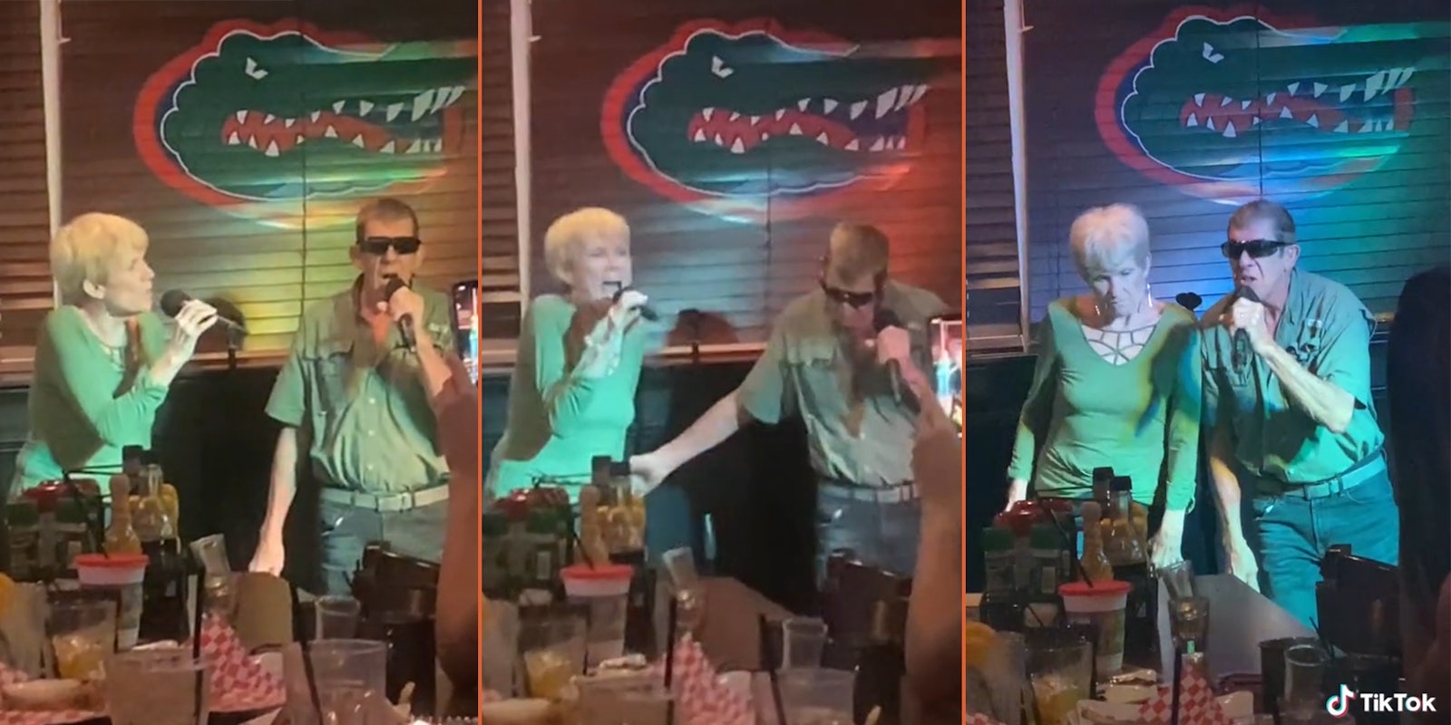 couple in bar singing karaoke