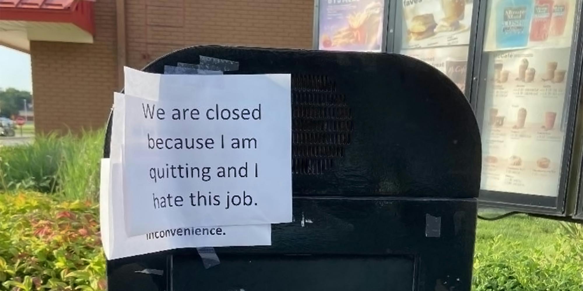 McDonald's drive-thru with "We are closed because I am quitting and I hate this job." sign taped to speaker