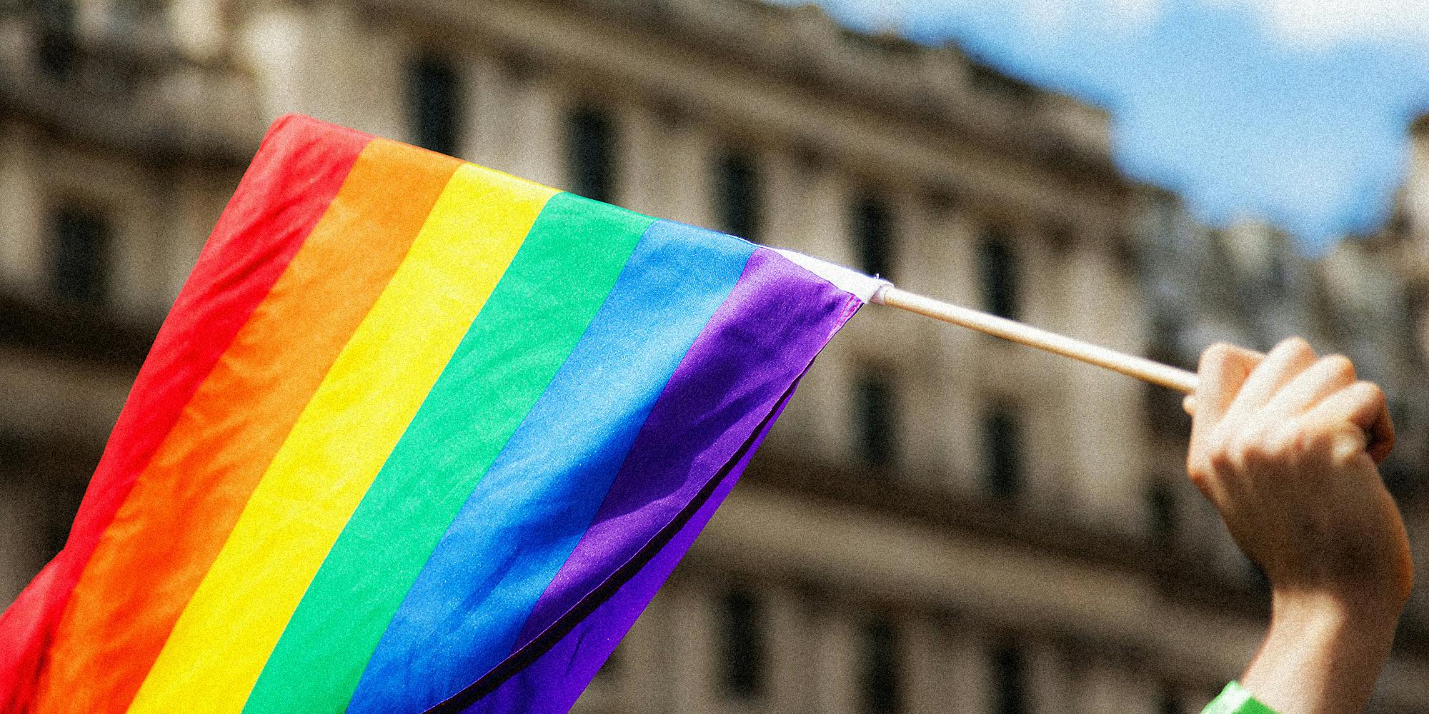 A pride flag in the air.