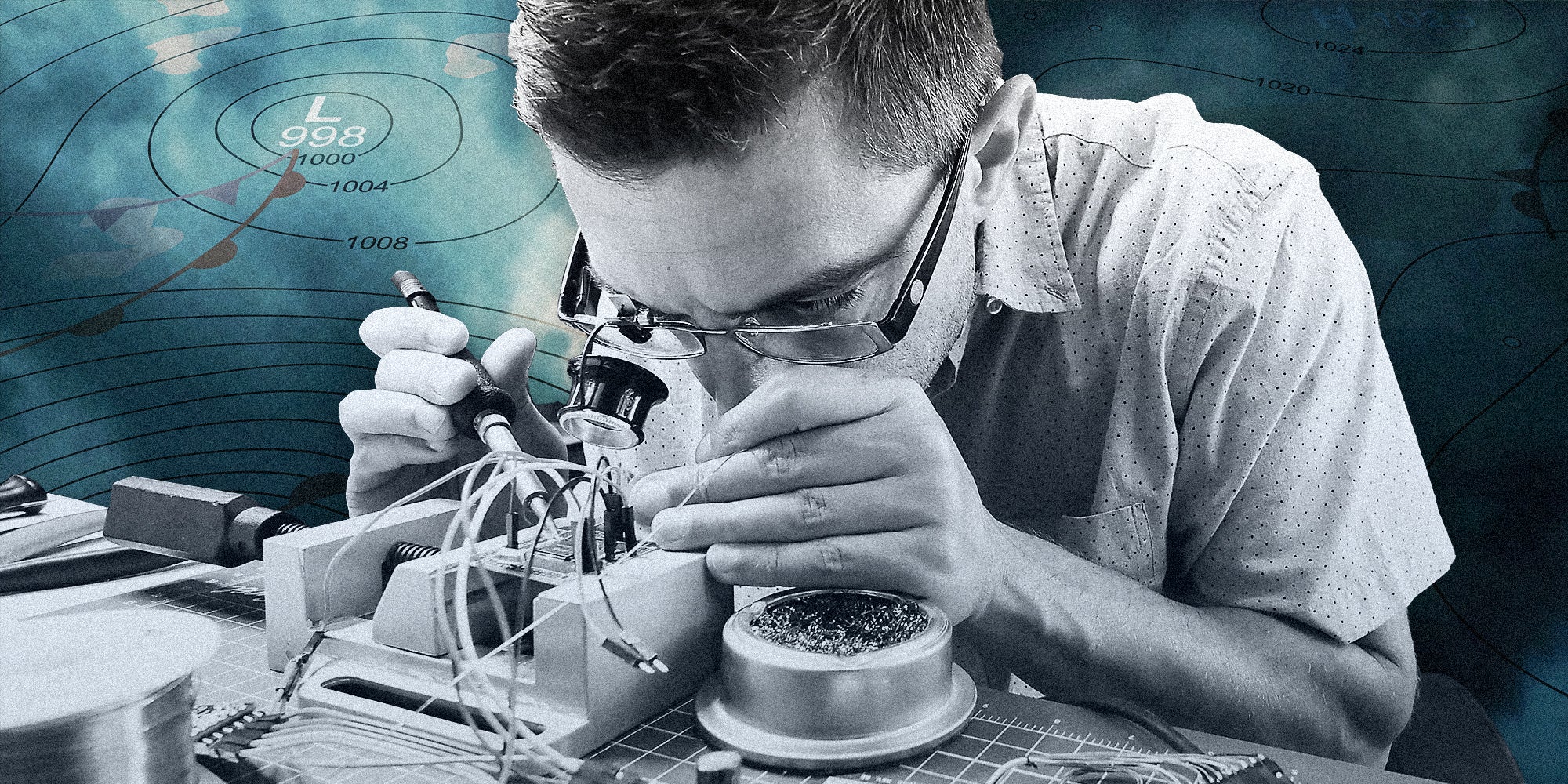 A man working on a thermostat.