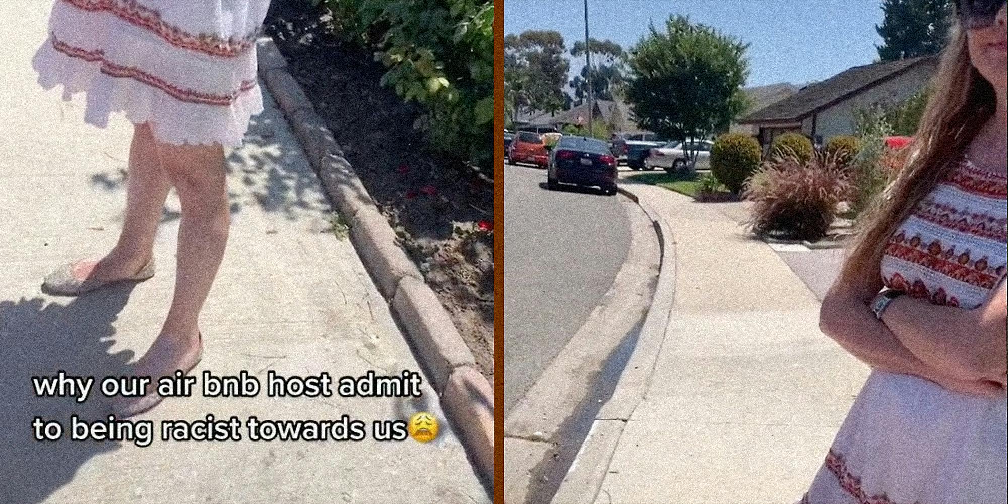 A woman standing on a sidewalk.