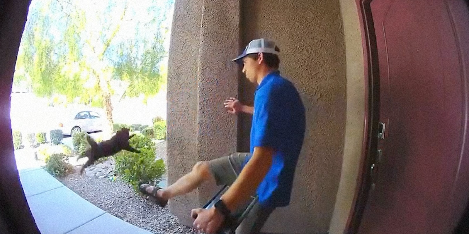 A man kicking on a cat off of a porch.