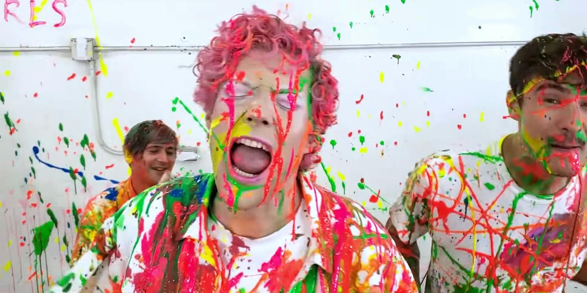 band members covered in paint