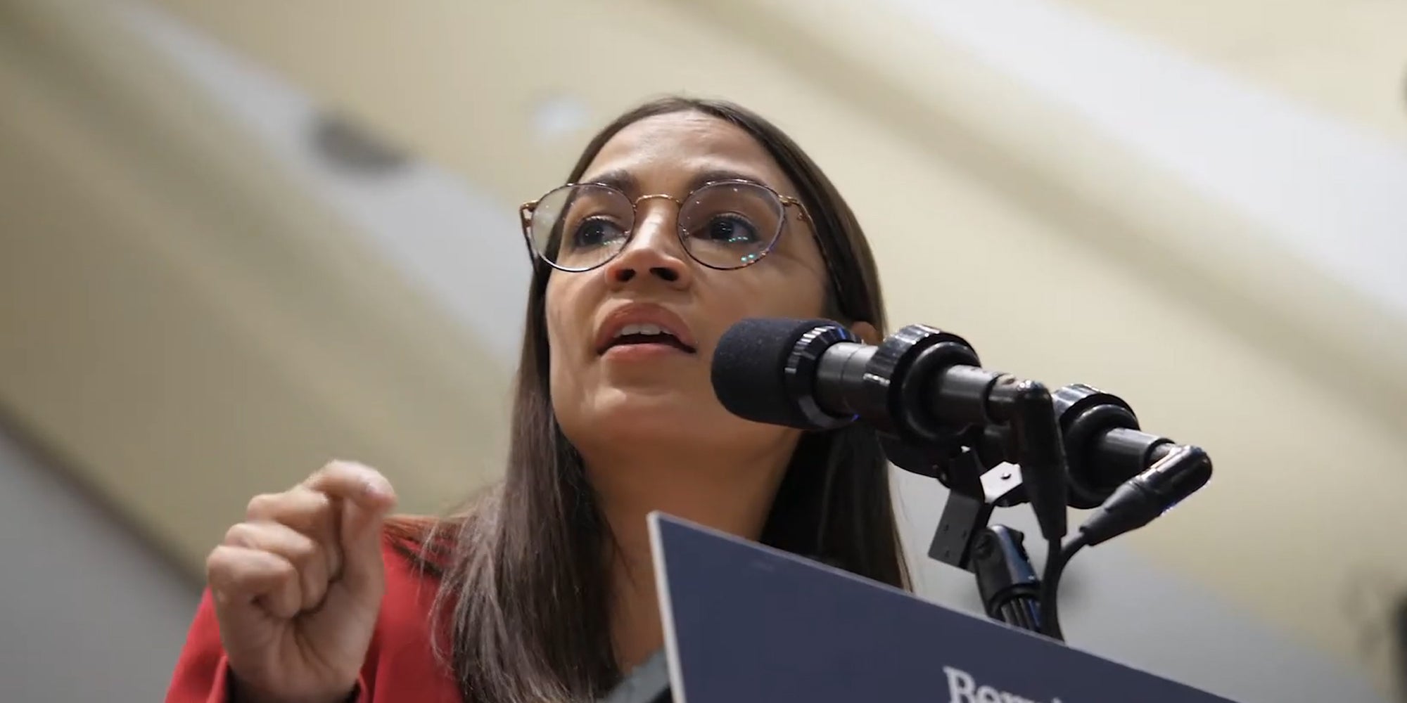 Rep. Alexandria Ocasio-Cortez (AOC) giving a speech.