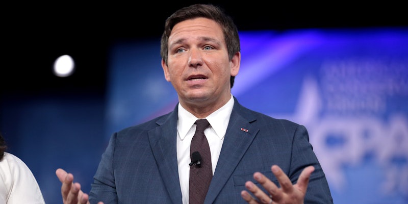 Florida Governor Ron DeSantis holding out his arms in a confused sort of way.