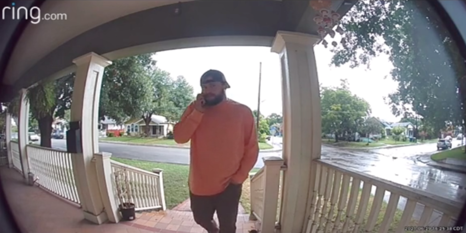 Ring doorbell camera screenshot of man walking up to porch of father in law's house as he calls him a 'dickhead'