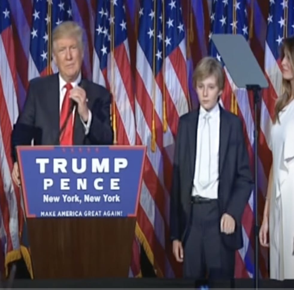 barron trump next to melania in 2016, showing how tall is barron trump in 2016