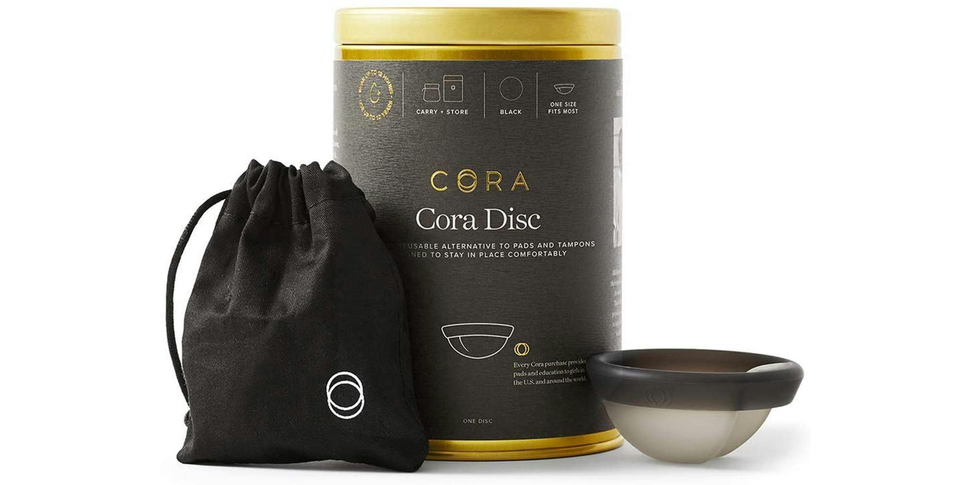 cora menstrual disc with packaging and silk case.