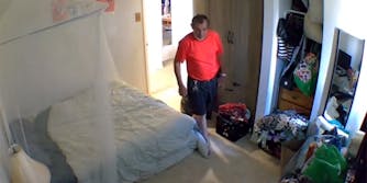 man walking into bedroom