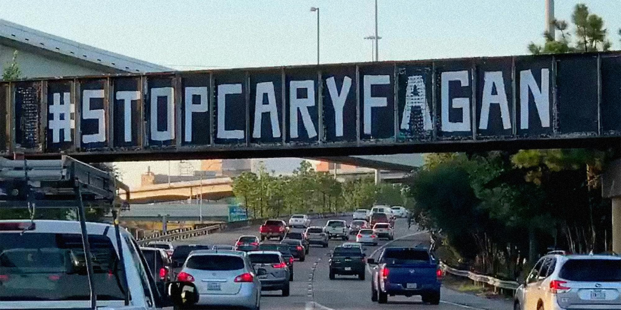 A road overpass with graffiti.