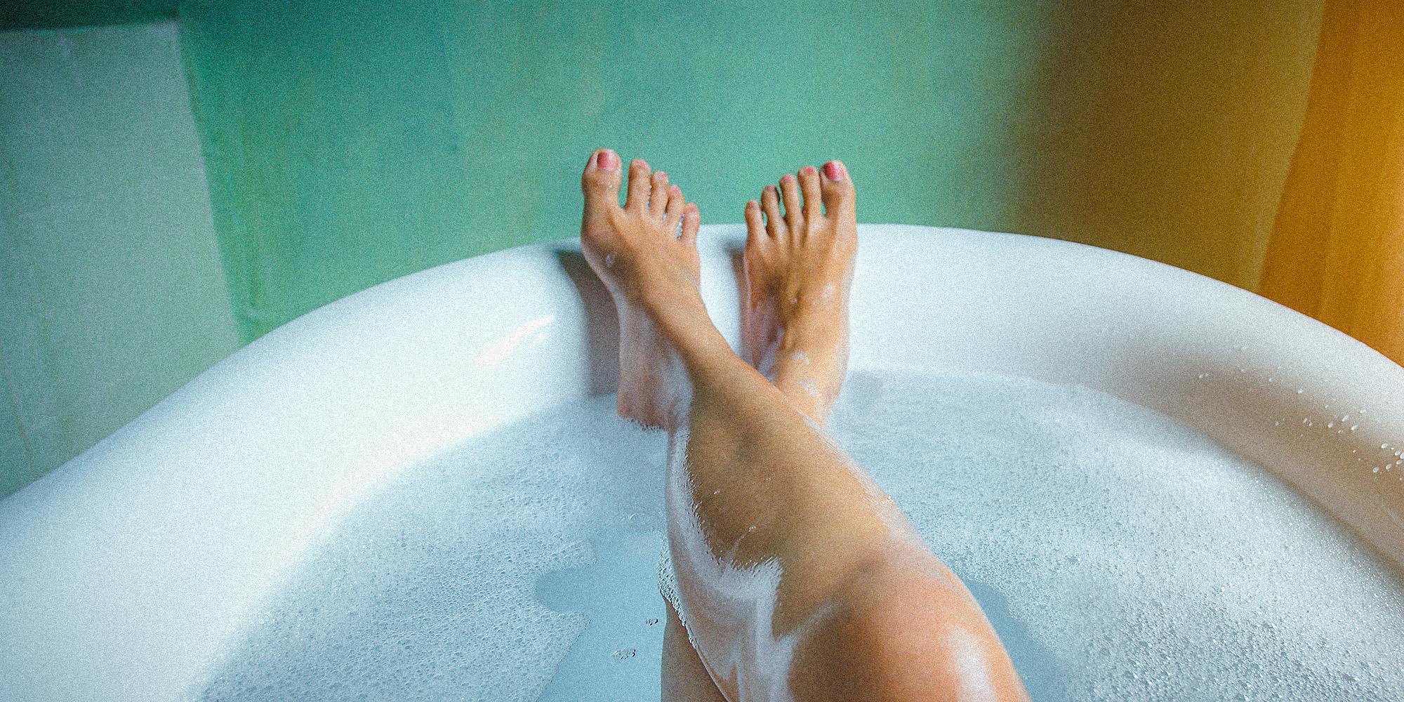 Legs in a bathtub.